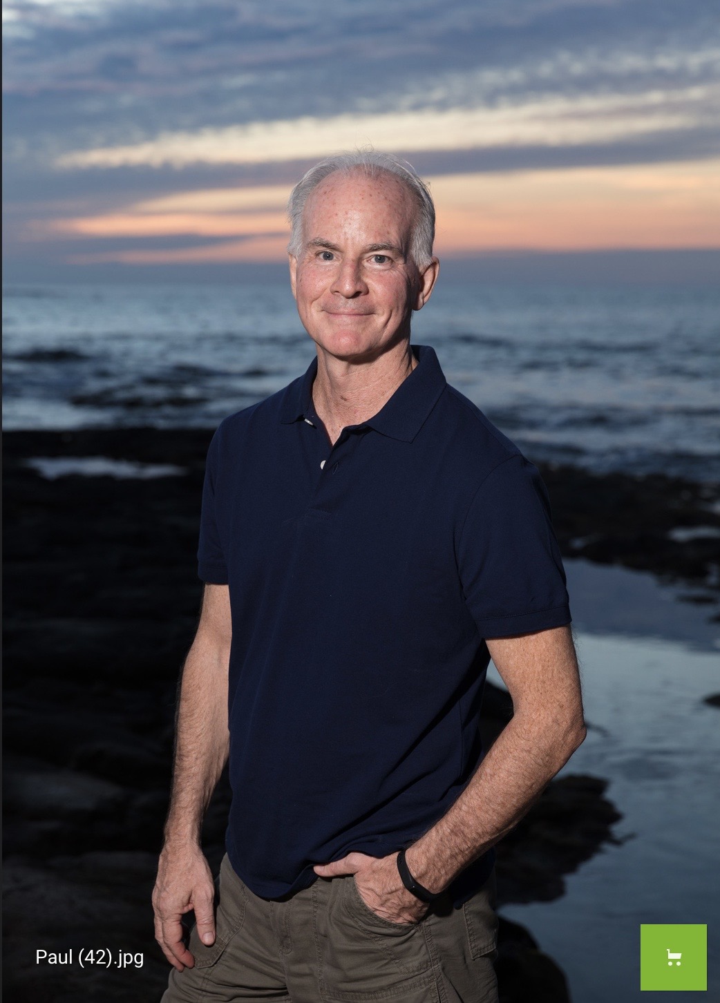 Paul Bauer by the ocean at sunset